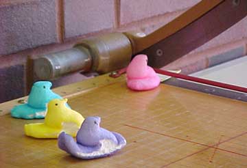 photo of Peeps using paper cutter
