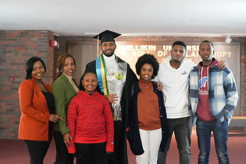 Family standing with graduate
