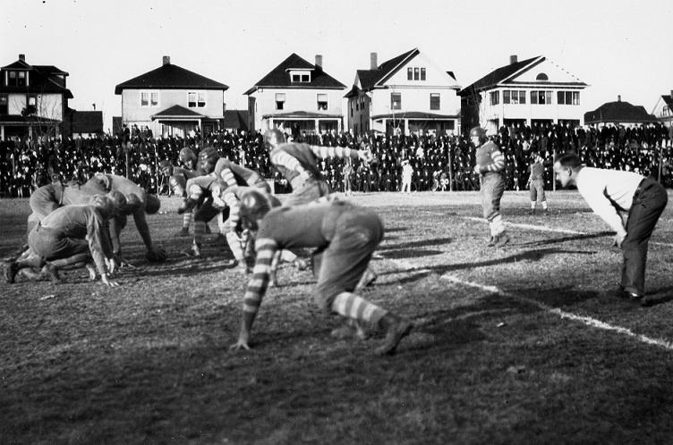 Black and white photo of a Millikin football game in the late 1910s