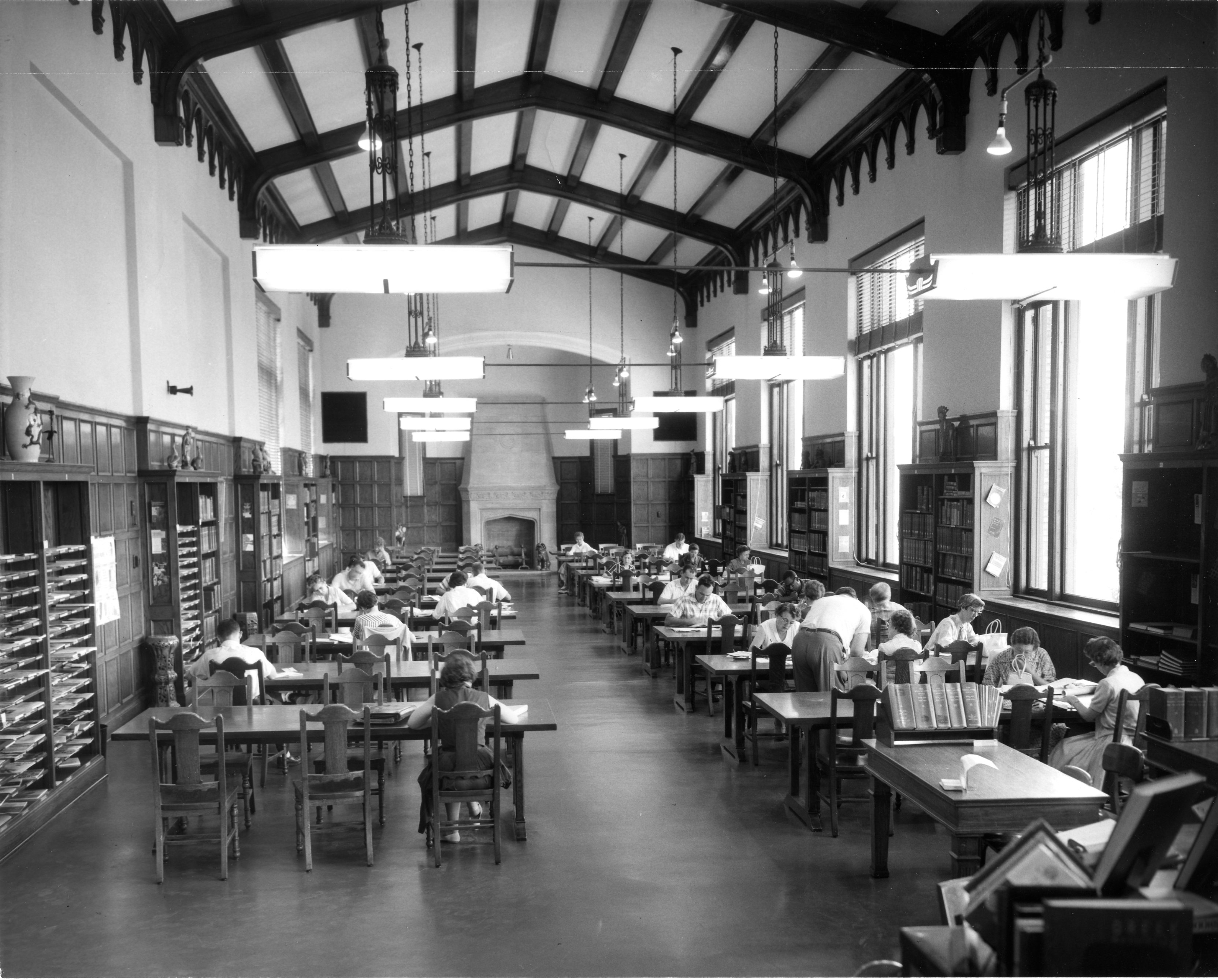 Black and white photo of Millikin students studying in Gorin's reading room