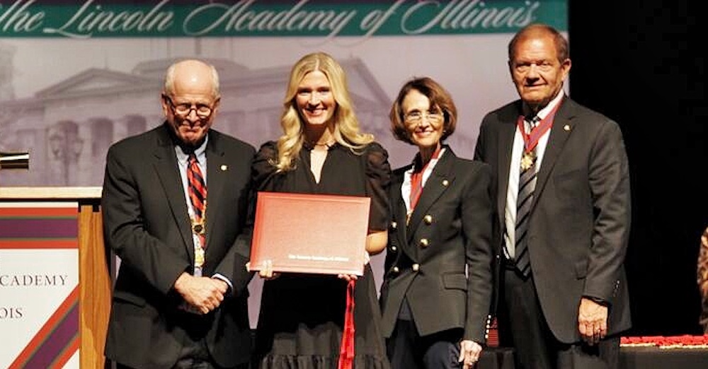 olivia swords recieving award