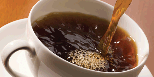 coffee pouring into a cup
