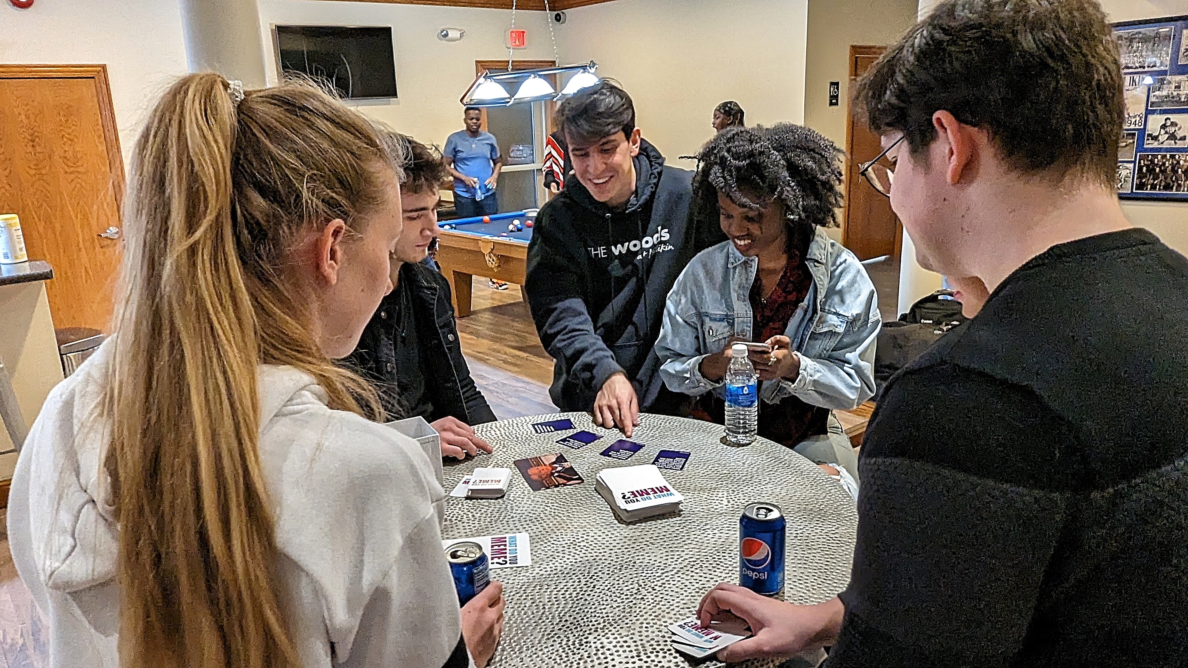 Students playing a card game