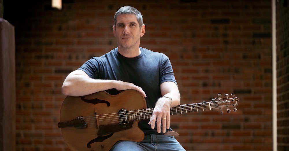 mark tonelli with guitar