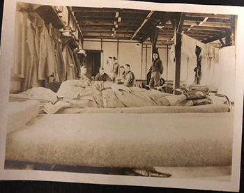 Men resting in barracks