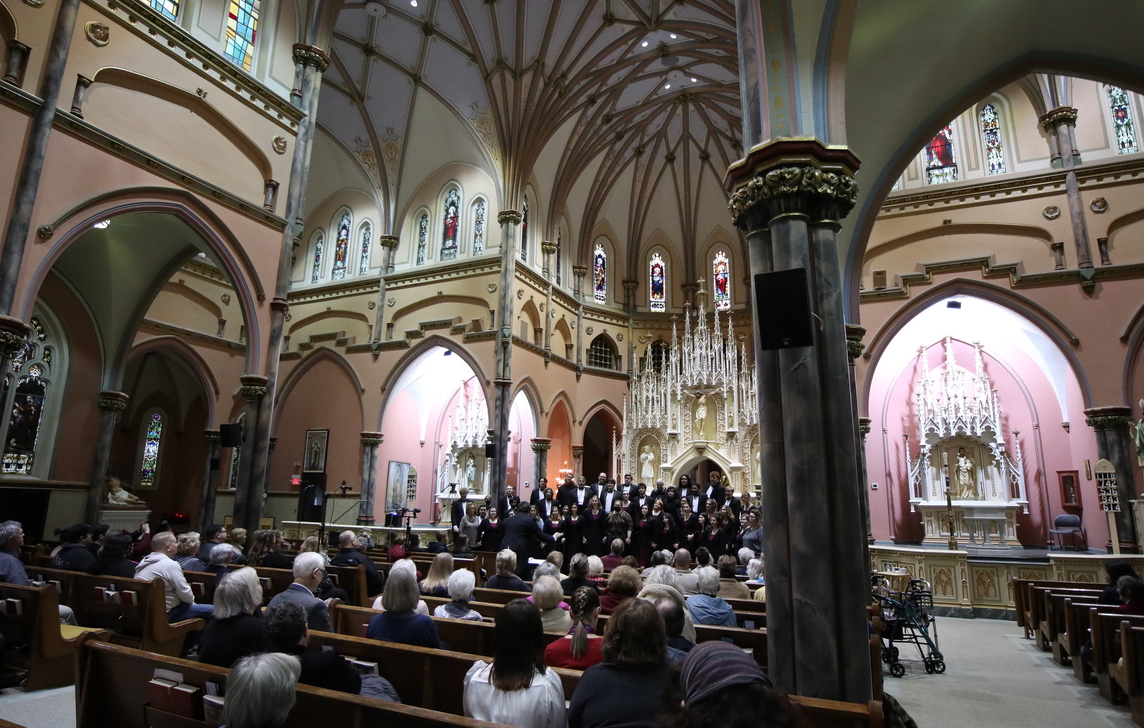 Interior of St. Patrick Church with the University Choir singing