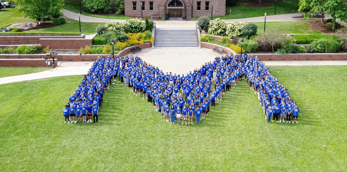 students in M formation