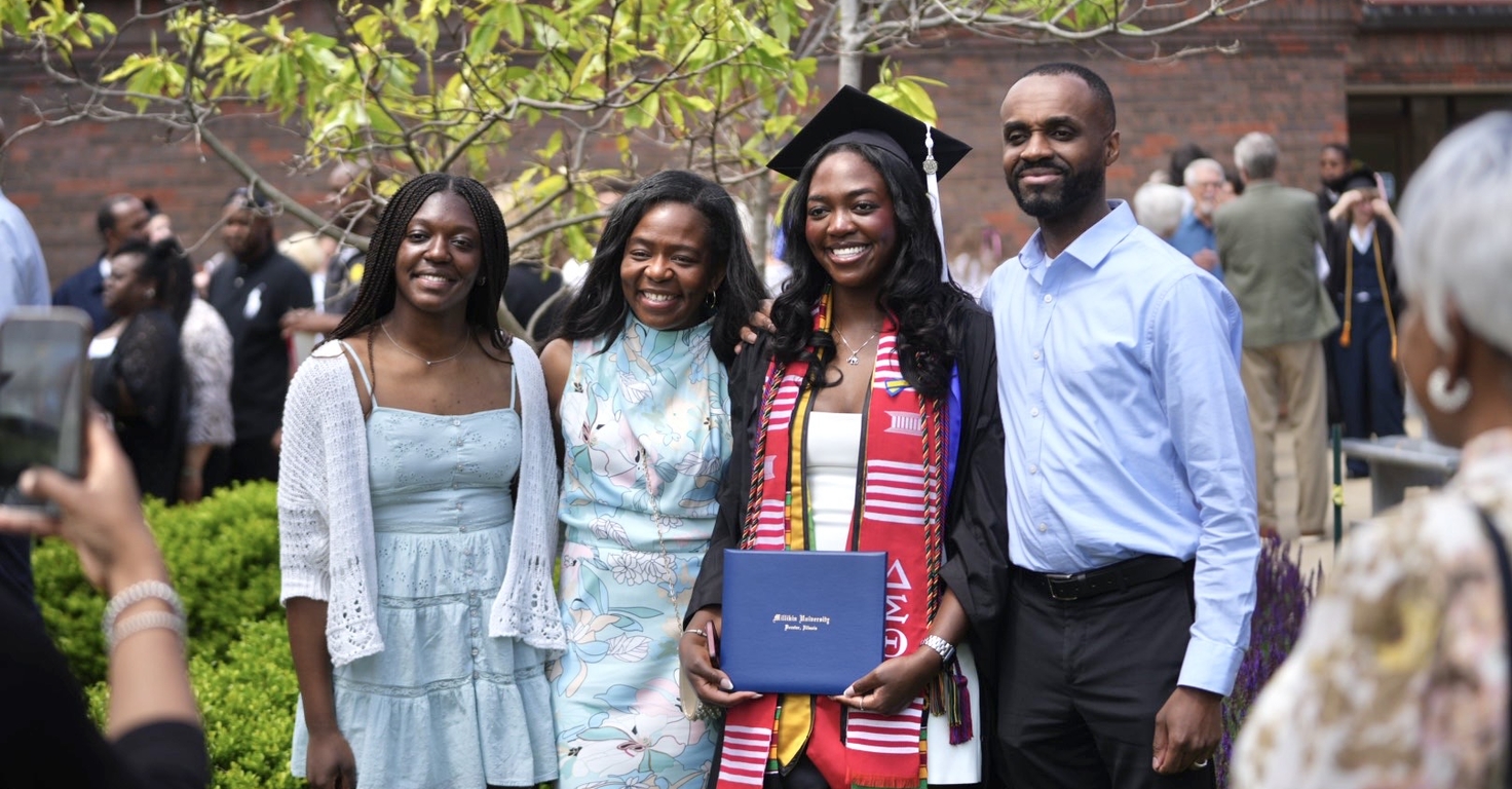 Family after Commencement ceremony with Millikin graduate