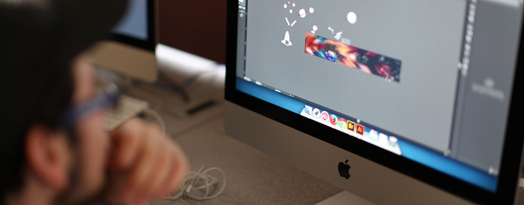 student editing an image on computer