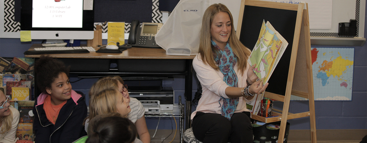 Teacher reading to students