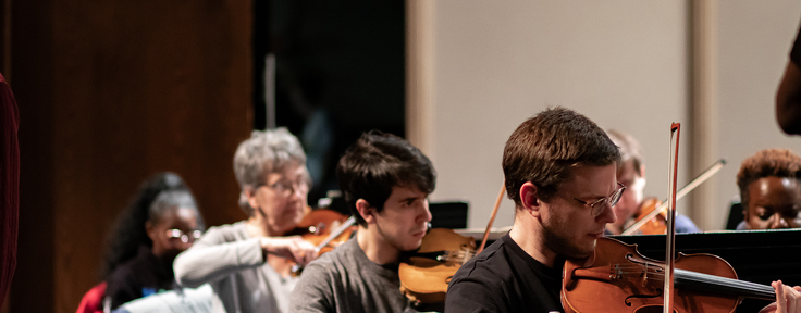 students playing violin