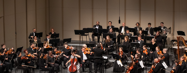 orchestra playing on stage