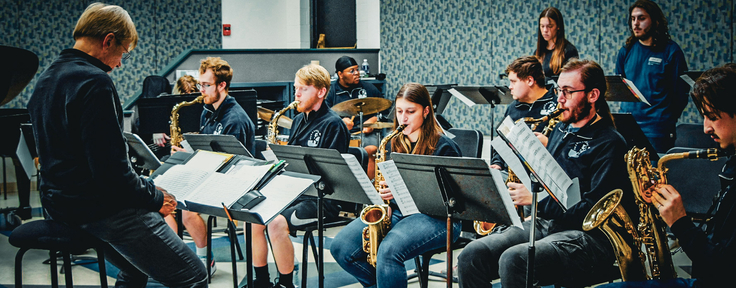 Faculty member with jazz students