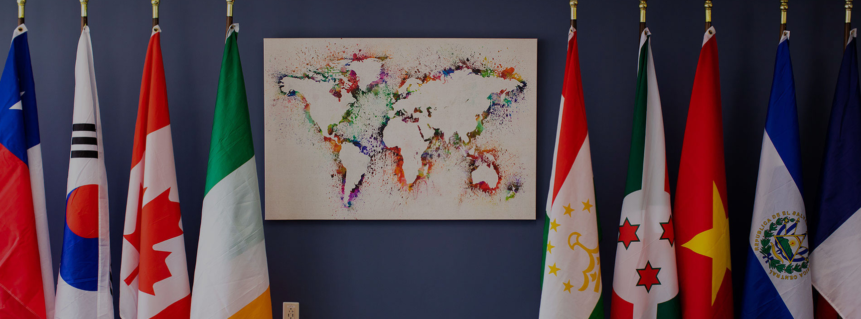 International flags next to a map of the world