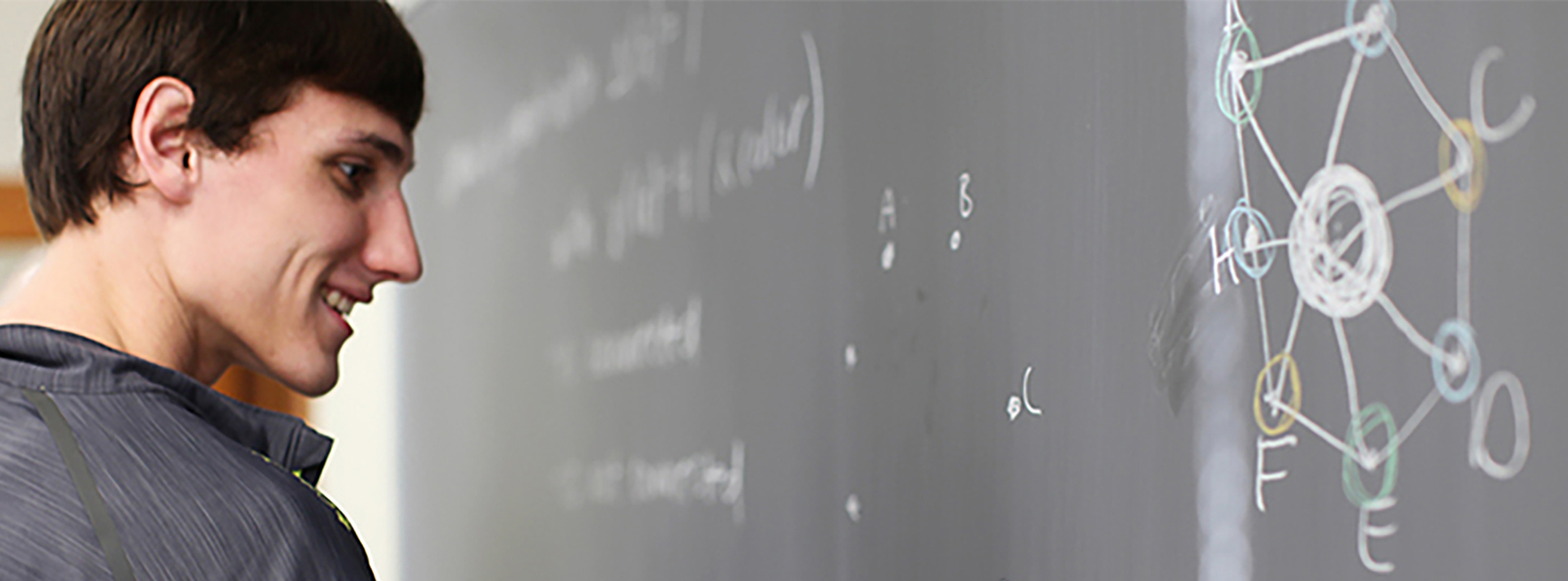 student writing equation