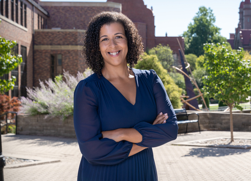 Amber Kaylor Headshot Outside Campus