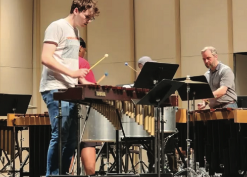 students playing percussion