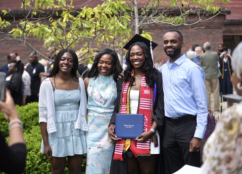 Family after Commencement ceremony with Millikin graduate