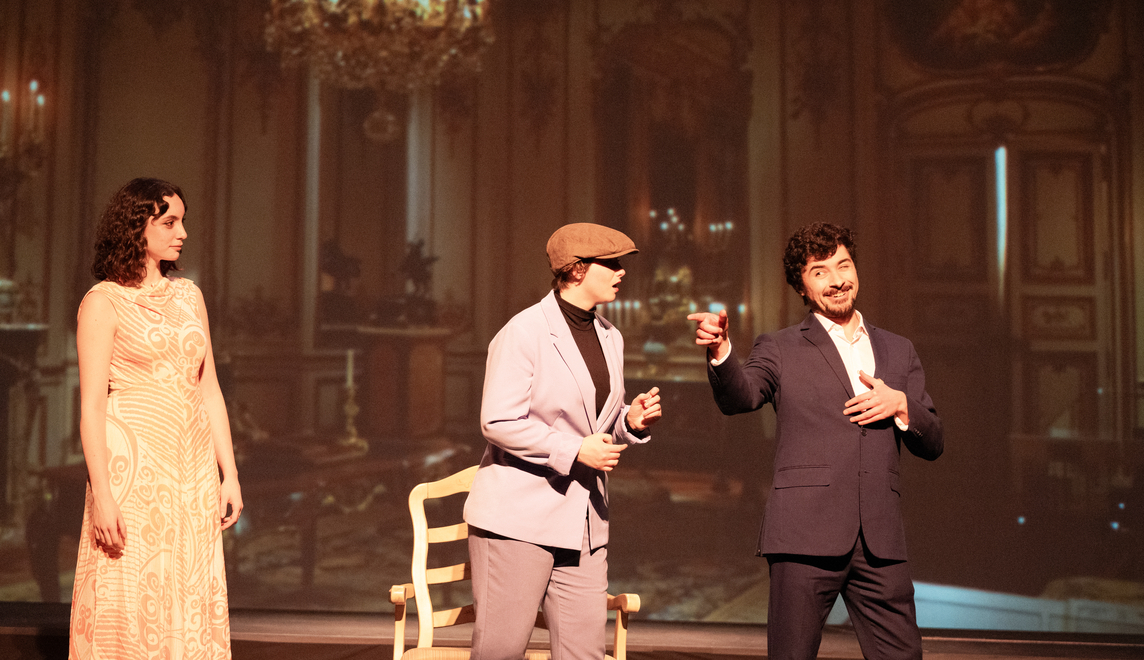 Millikin students sing opera on stage in Albert Taylor Theatre. 