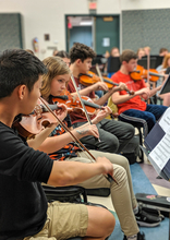 Children playing violin!