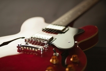 Close up of an electric guitar. 